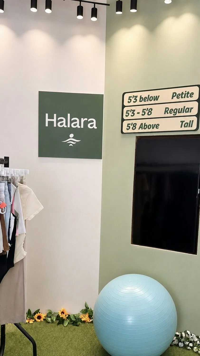 Halara activewear rail and branded wall in the Manchester live studio
